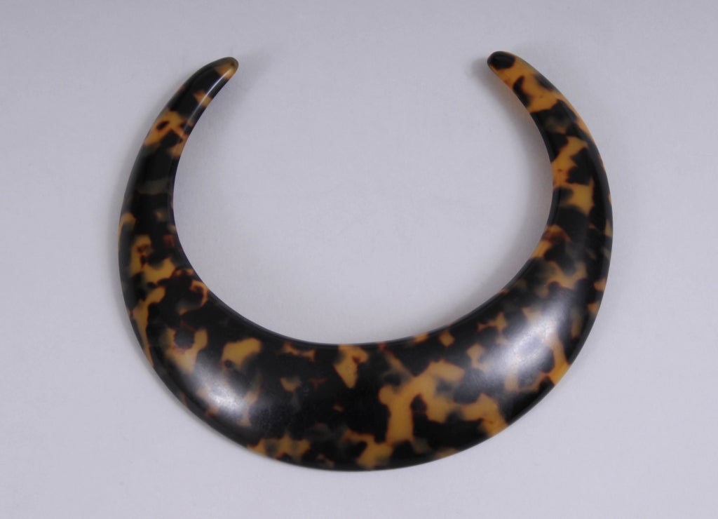 This is a great example of a fabulous 1970's choker necklace that was so popular during this period.  The faux tortoise is beautifully mottled with a depth of color and dimension that makes it look like genuine tortoise. It fits comfortably on the