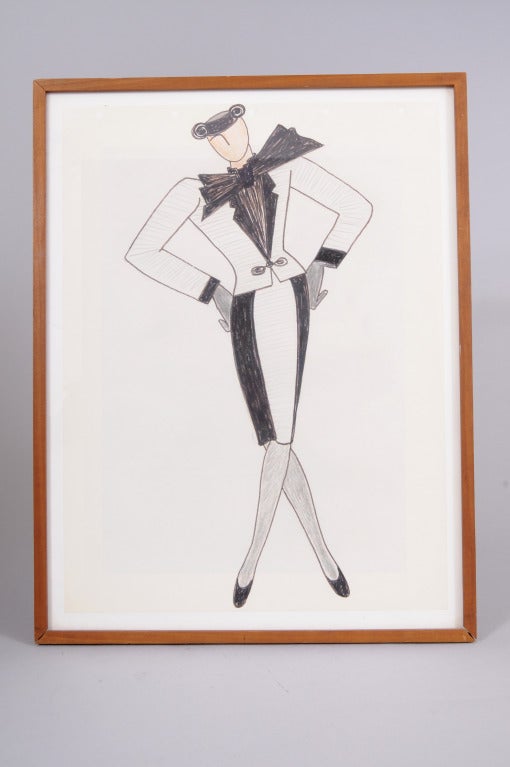 A gift from Yves Saint Laurent to his dear friend Marina Schiano this charming and  original fashion drawing shows a woman in a classic YSL suit with an exaggerated bow at the neckline and tricorn hat on her head. Framed under glass on both sides,