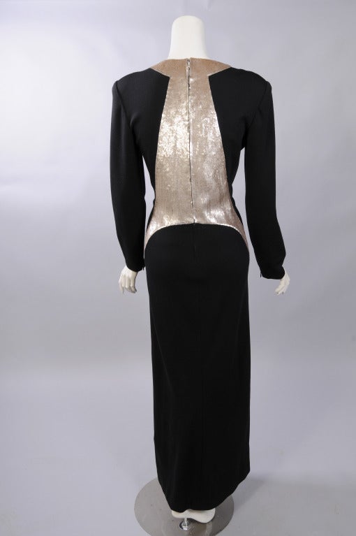 A black wool jersey evening dress with nude sequin embroidered silk crepe insert from the Fall 1989 collection is featured in the book Geoffrey Beene by Brenda Cullerton. This elegant dress is in excellent condition.
Measurements;
Shoulders