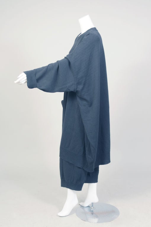 This Miyake two piece linen and cotton tunic and pants outfit is amazing! Perfect for dinner in town, superb for plane travel and so chic for relaxing or entertaining at home.<br />
The oversized tunic top is cut like a sweater with a round ribbed