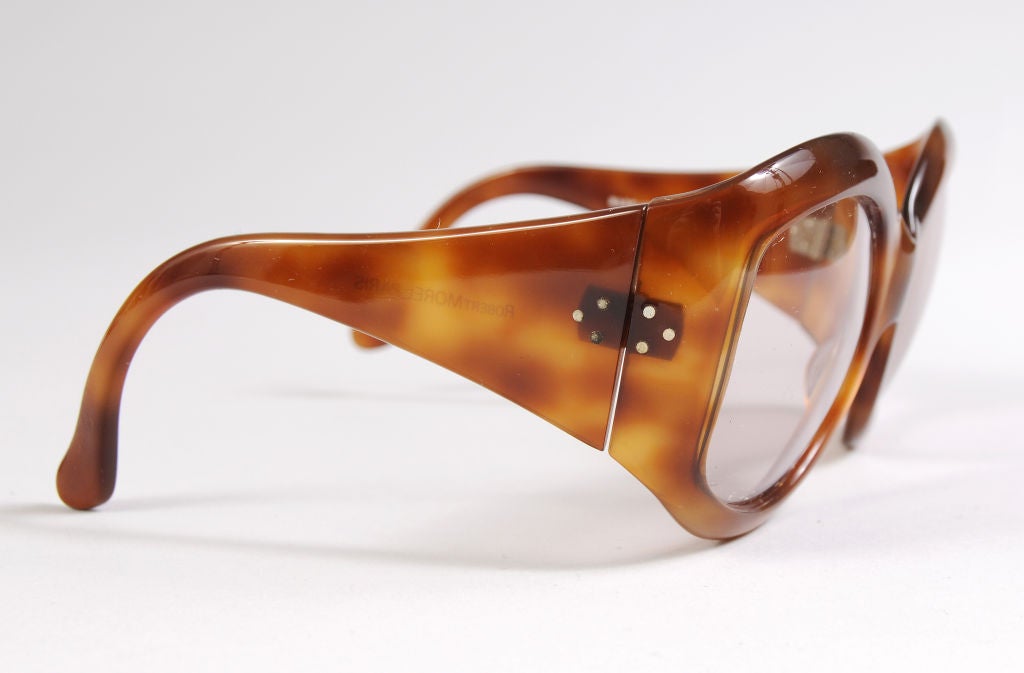 Chic and stylish, timeless tortoise sunglasses from Robert Morel are oversized and elegant. They are in excellent condition.

Measurements;

Height 2 1/2