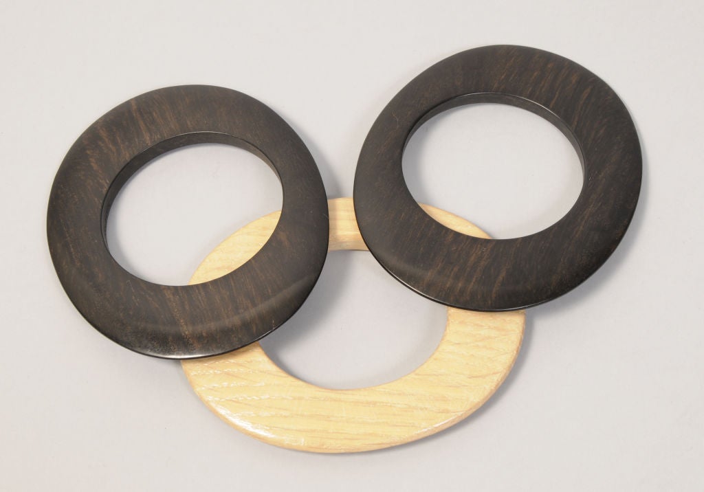 Fabulously chic, these wooden bangles are wide, almost flat ovals. How very modern, the perfect accessory day or evening.<br />
<br />
Measurements;<br />
Length 4 3/4