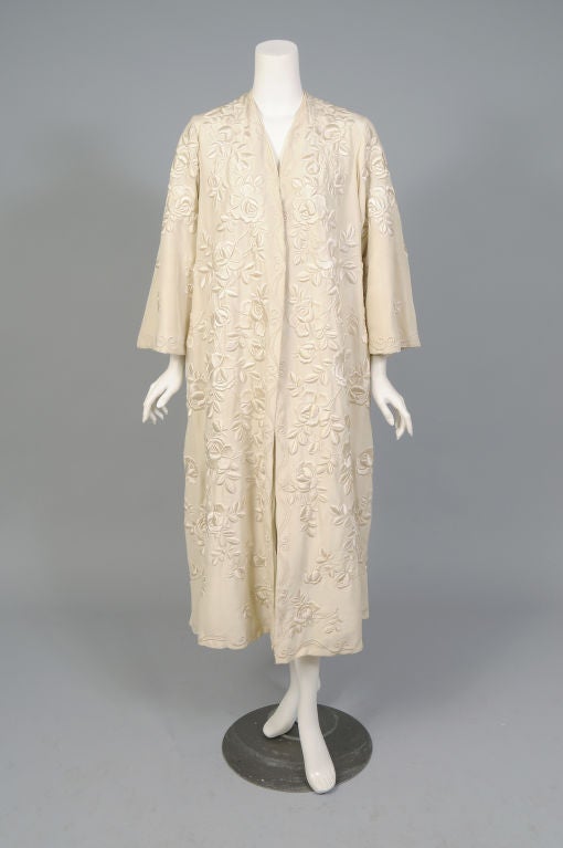 The exquisite condition and luminous hand embroidery, as well as the generous size make this the nicest Chinese embroidered coat that I have ever offered for sale. Hand embroidered in China circa 1900, the cascading roses are so exuberant, the