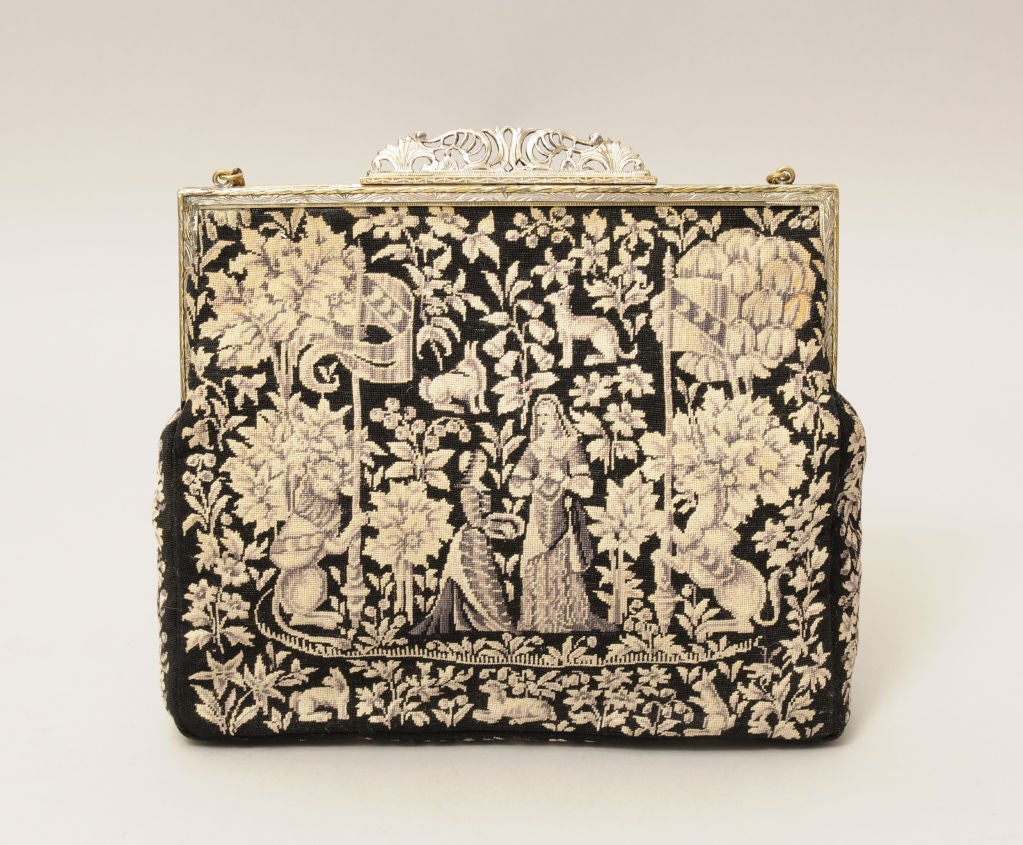 The design for this evening bag is inspired by The Lady and The Unicorn tapestry at The Cluny Museum in Paris. Designed circa 1500, legend has it that only a virgin could seduce the Unicorn, he was so wild that only a virgin could tame him.<br
