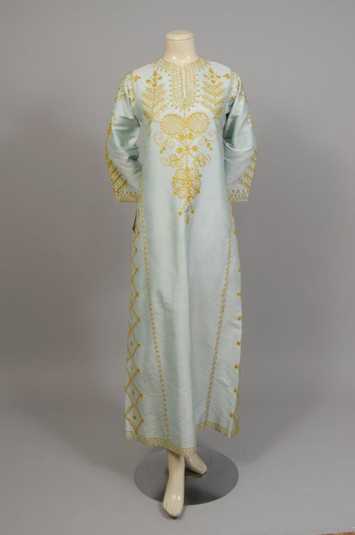 A stunning pale blue silk caftan with copious hand embroidery was custom made for the elegant Madison Avenue shop of Helene Arpels, the wife of the jeweler, Van Cleef & Arpels. This caftan is from the estate of Lyn Revson and it is in excellent