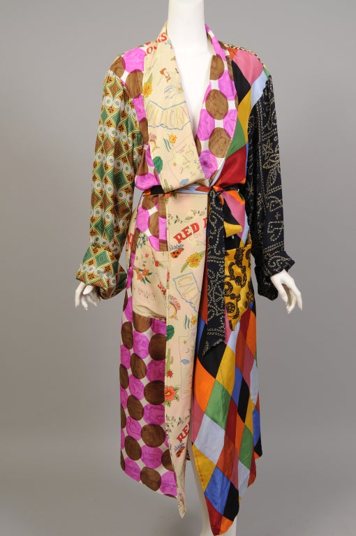 Todd Oldham has used a riot of colorful silk prints for this cheerful wrap style robe. It is in pristine condition from the estate of Lyn Revson. The tag says 