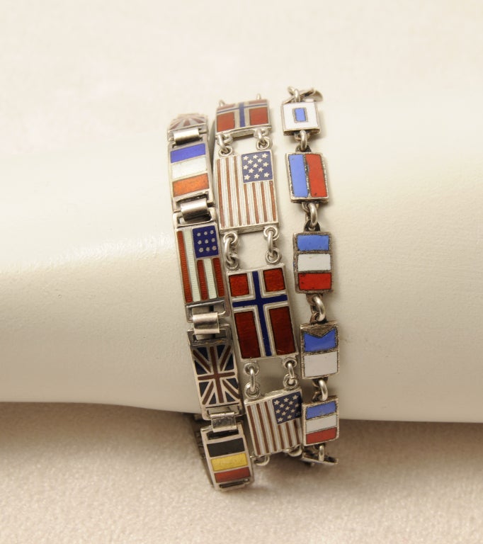 A group of three nautical or signal flag bracelets in enamel on sterling from the 1950's could be the start of your collection.  They are in excellent condition.

Measurements;
Length 7
