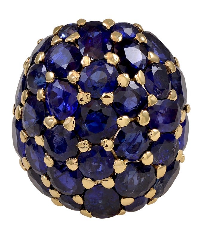 Seaman Schepps oval and round brilliant cut sapphire ring.  The sapphires have a total estimated weight of 27.50cts. The design is of the same style as the iconic Seaman Schepps turtle of the 1940's, featured in the book "Seaman Schepps A