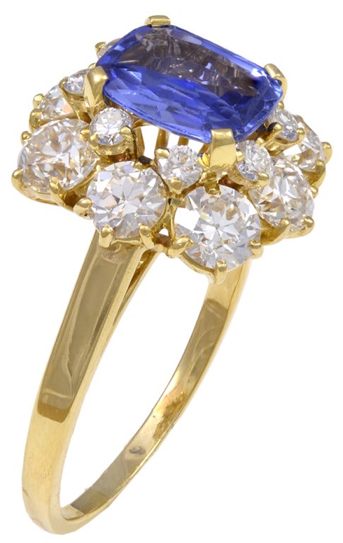 A beautiful Bulgari cushion shaped sapphire and diamond ring set in 20k yellow gold.  The sapphire weighs 2.19cts, and the transitional cut round diamonds are a total estimated weight of 2.00cts.

Signed 