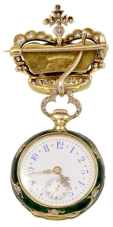 A very well crafted Dreicer & Son diamond and green enamel 18k yellow gold pocket watch brooch.  The diamonds are old European cuts, and have a total estimated weight of 2.84cts.

Signed:  Dreicer & Son

*The watch is in working order.
