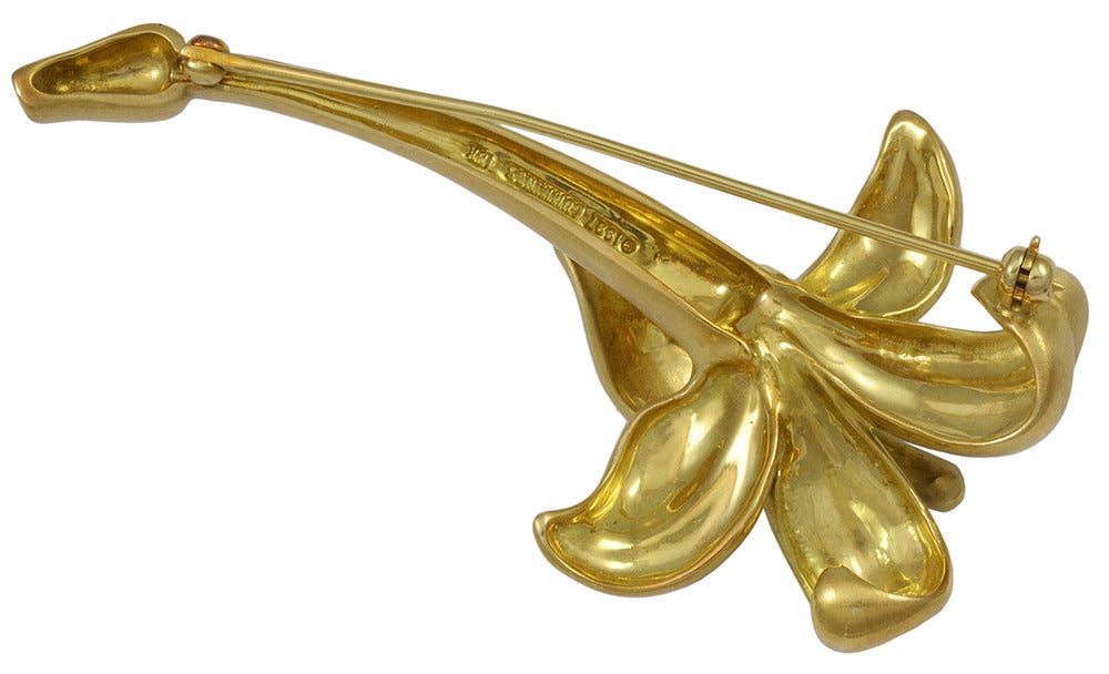 Beautiful 18k yellow gold Lily flower brooch created by Angela Cummings in 1997. Elegant matte finish and perfect smooth lines make the brooch feminine and classy.