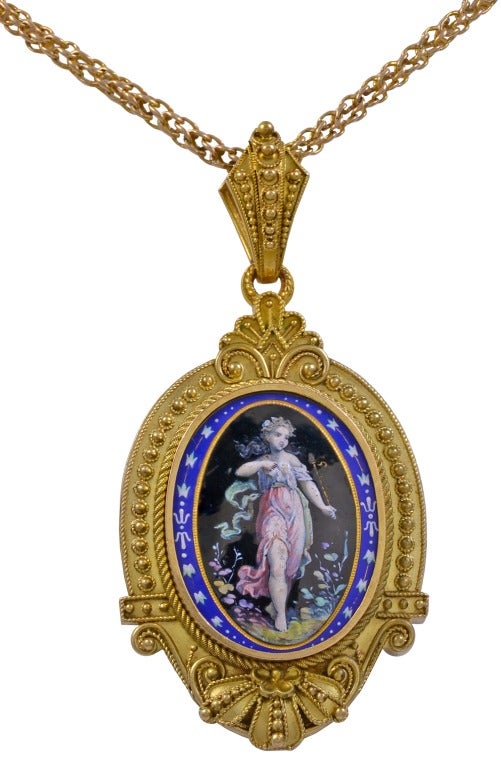 A very detailed Victorian era enameled locket and earring set, in 14kt yellow gold.  This set has beautiful enamel work.

Pendant/Locket: 2.60