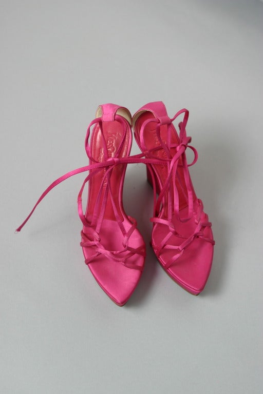 Yves Saint Laurent, by TOM FORD, circa 2002

Sublim pair of hot pink silk satin criss cross wedged evening sandals

Inner sole of pink leather stamped pink.
Natural color leather soles.

Marked size : 37 
Approx. US Size : 7
Heel : 12