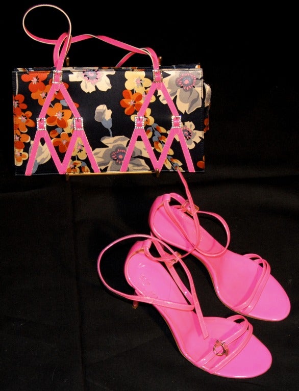 John GALLIANO, Paris, summer 2004

A superb matching set fluo pink plastic shoes, printed silk satin handbag with fluo pink and diamanté plastic straps.
Absolutely gorgeous..
Shoes : size 37 EU hot pink clear plastic stiletto heels
The shoes
