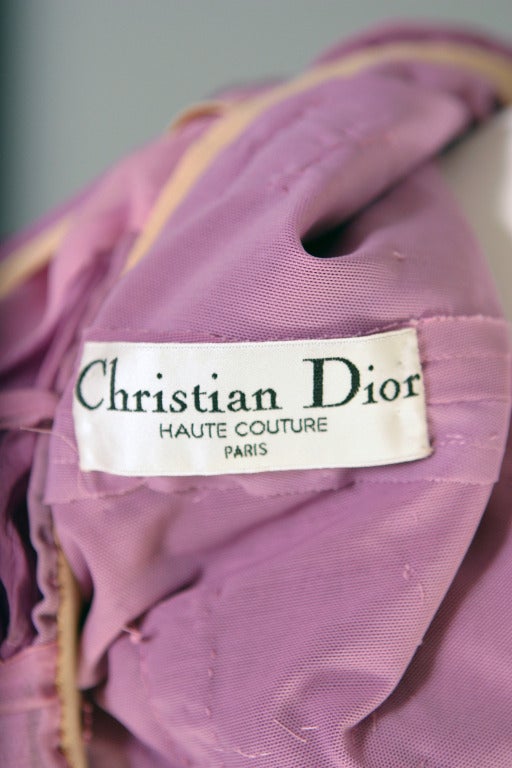 Christian DIOR, by John GALLIANO, haute couture, spring- summer 2007.

A rare and marvelous mauve silk chiffon cocktail dress, labelled and marked ''Christian Dior haute couture Paris '' white label, black script.
Simple square front and back