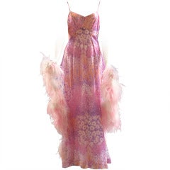 1970s Vaporous printed chiffon and ostrich feathers evening gown