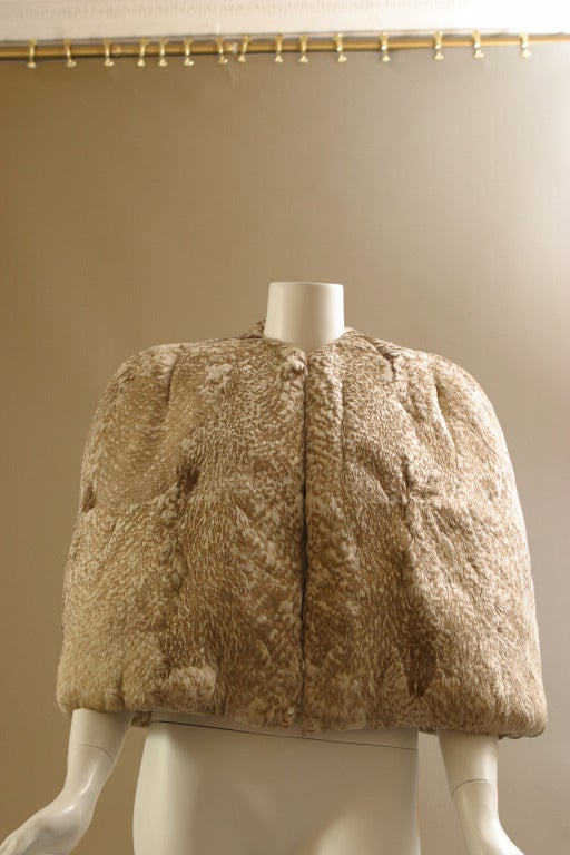 Circa 1930- 1950

A dramatic sea gull cape, of sculptural lines, beautifully cut, lined in superb and shimmering, antic silver lurex, silk organza. The lining , hand sewn, is made on the exact shape as the original( rust spotted), complete with