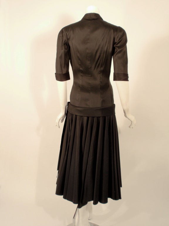 Traina Norell Black Satin Cocktail Dress, Drop Waist & Full Skirt xs In Excellent Condition For Sale In Los Angeles, CA