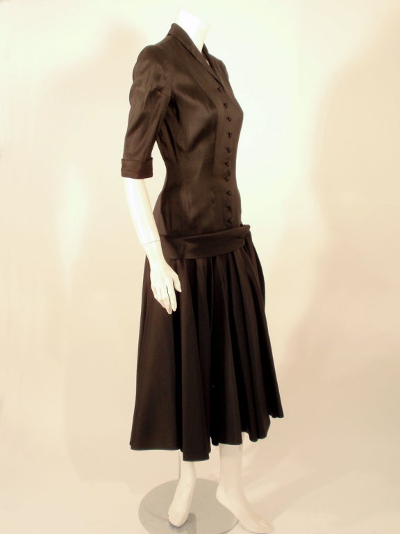 Women's Traina Norell Black Satin Cocktail Dress, Drop Waist & Full Skirt xs For Sale