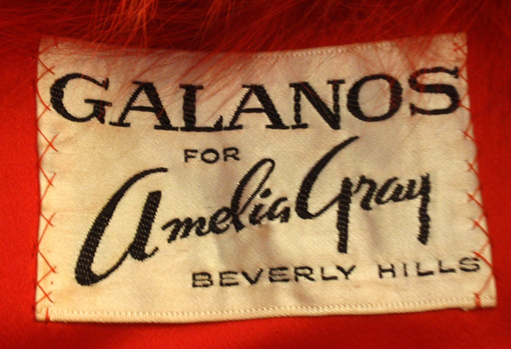 This is a spectacular JAMES GALANOS maxi coat from the 1970s. The coat is wool with Mohair which gives the fabric a luxurious texture to compliment the supple Fox fur collar and matching cuffs. The Fox fur was originally from Edwards Lowell of