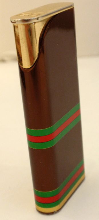 Women's Gucci Vintage Signature Gold Stripped Lighter, Circa 1970
