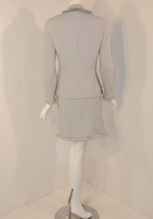 Christian Dior - Tailleur jupe 2 pièces bleu clair avec revers à franges, circa 1990 Pour femmes en vente
