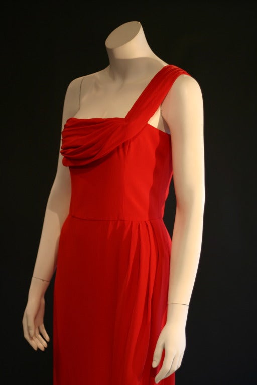 Only Givenchy can do a red this true- it is striking!

This beautiful crepe-silk gown is ultra thin and light, yet gives the wearer fantastic coverage- that's the power of couture!

I cannot say enough about this gown, it has everything a woman