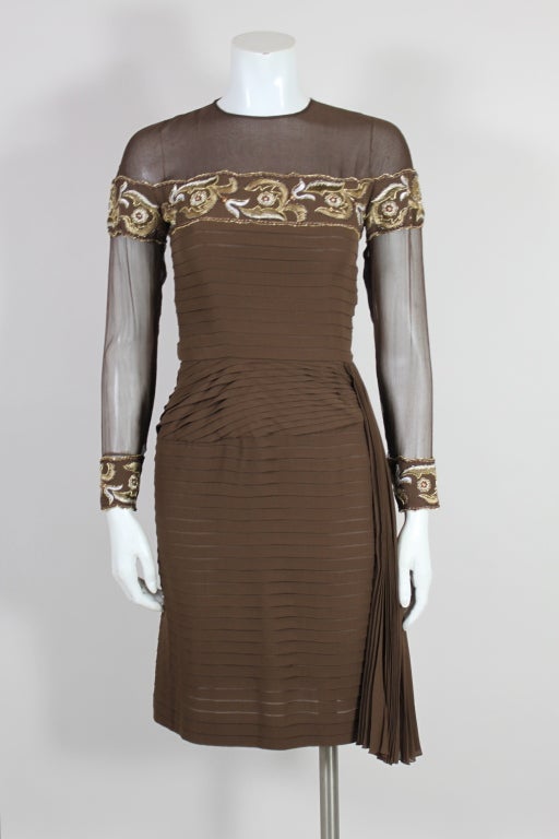 Gorgeous, chocolate brown silk chiffon afternoon to cocktail dress with intricate detailing in applied embroidery and pleating. Dramatic side swag pleated detail. 