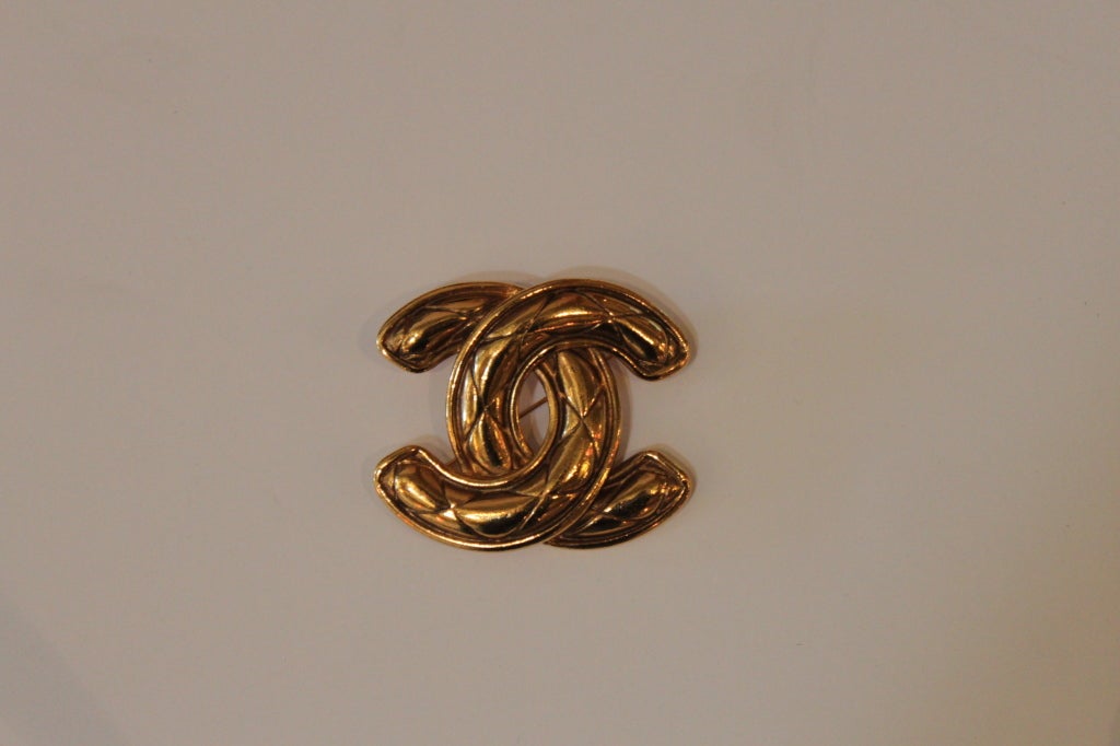 Chanel Quilted Goldtone Monogram Brooch at 1stdibs