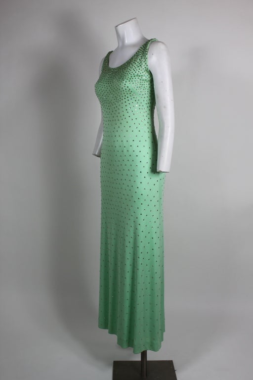 Gorgeous mint green gown with radiating rhinestones from iconic American designer Adele Simpson. Fully lined.

Measurements--
Bust: 32