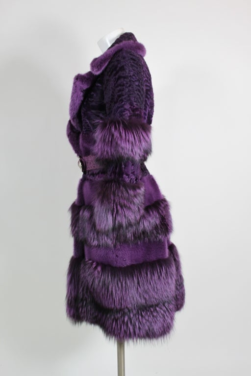 Stunning Bill Blass purple fox fur and curly lamb tiered coat. Accompanied by woven purple belt with silver medallion buckle.