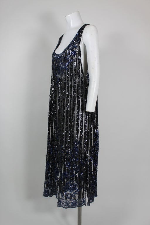 1920's flapper party dress with black and navy sequins in a filigree pattern. Embellishments done on unlined silk tulle.