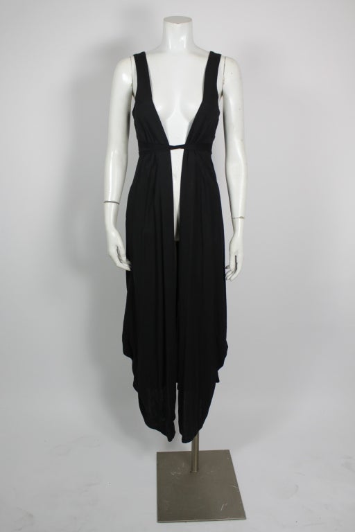Full length rayon crepe vest with adjustable straps to raise hem to create 