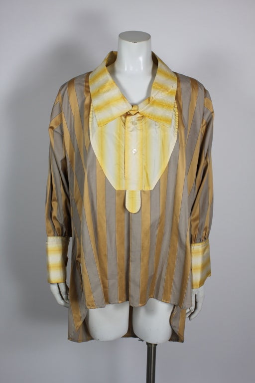 IN THE COLLECTION OF THE METROPOLITAN MUSUEM.  Worlds End shirt Circa 1980-83

Gold and grey striped cotton wit large collar and deep cuffs.  A rare and collectable piece.