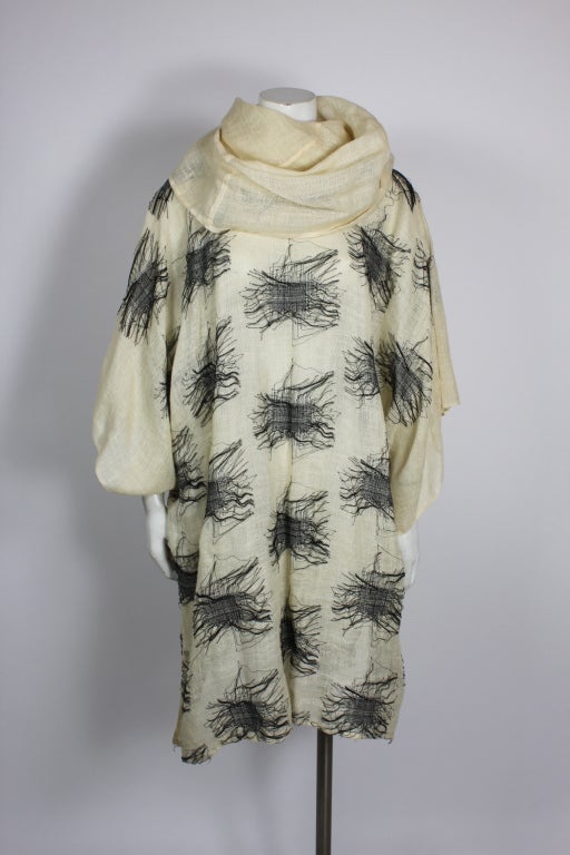 Rough linen oversized tunic with cowl neck. Spiderweb black criss cross embroidery. As seen pictured in 