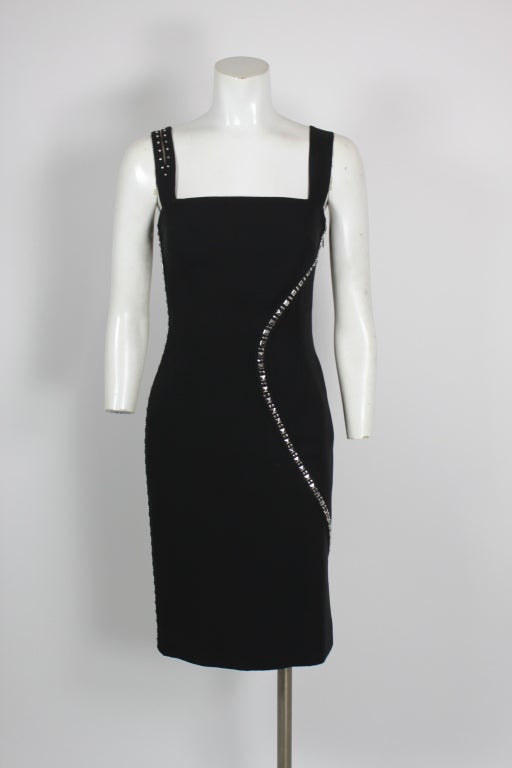 Classic Versace little, black body-con dress set with a sinuous row of silver-tone studs. Studded on one shoulder strap.