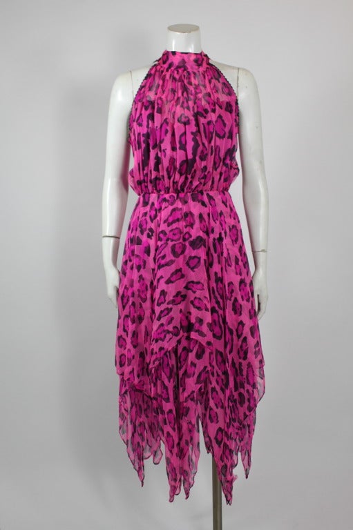 This fabulous dress from Australian brand fashion house Merivale is done in a sheer leopard print chiffon. High necked and with a gathered waist, the dress is given an edge with its asymmetrical handkerchief hemline. 

The bodice is
