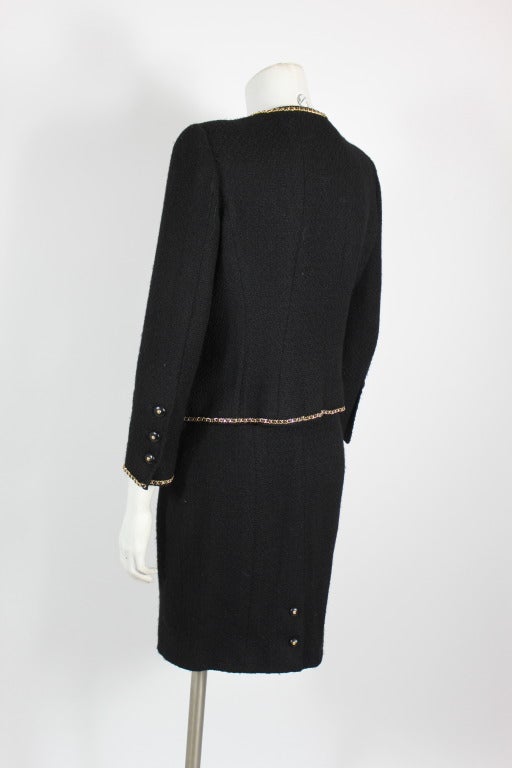 Women's Chanel Black Bouclé Tweed Suit with Gold Chain Detail