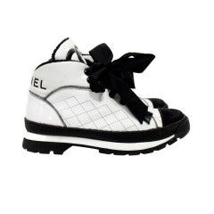Chanel Black 
White Quilted Sneakers