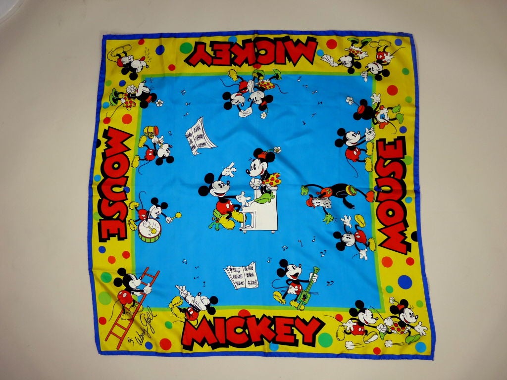 Whimsical musically themed retro Mickey Mouse print silk scarf done in vibrant colors from designer Wendy Gell.<br />
<br />
Measurements:<br />
<br />
34