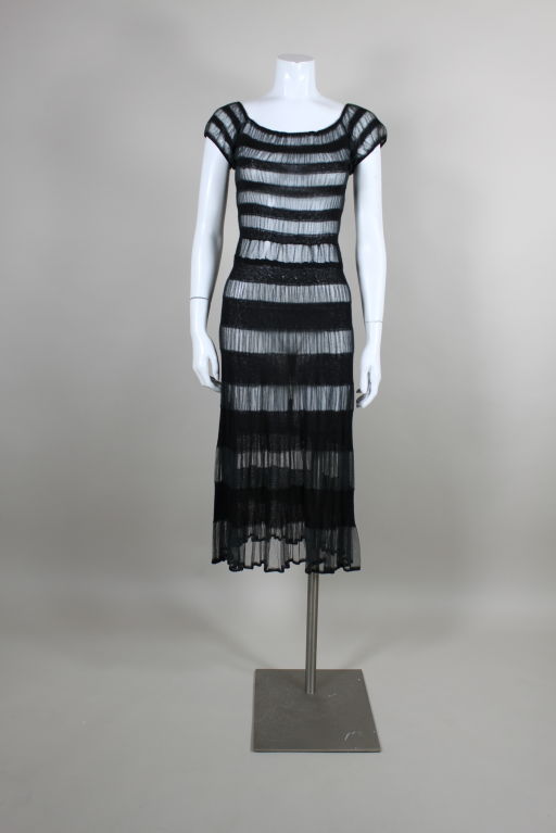 Super sexy 1930's dress from Henry a la Pensée features alternating bands of the darkest sage green soft cotton tulle and knit black cotton. Low scoop neckline, cap sleeves and body hugging cut make for a sexy silhouette reminiscent of Jean Paul