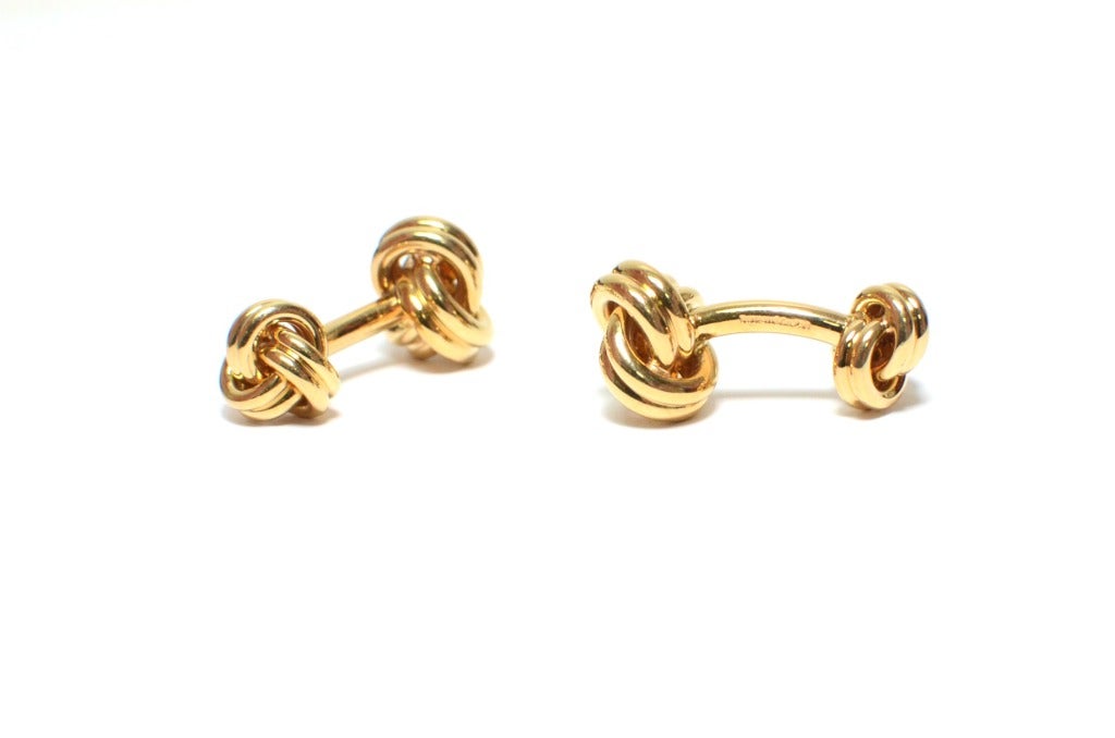 Tiffany & Co Yellow Gold  Knot Cufflinks in box.

Hallmarked: Tiffany & Co 750

Tiffany Box : Yes