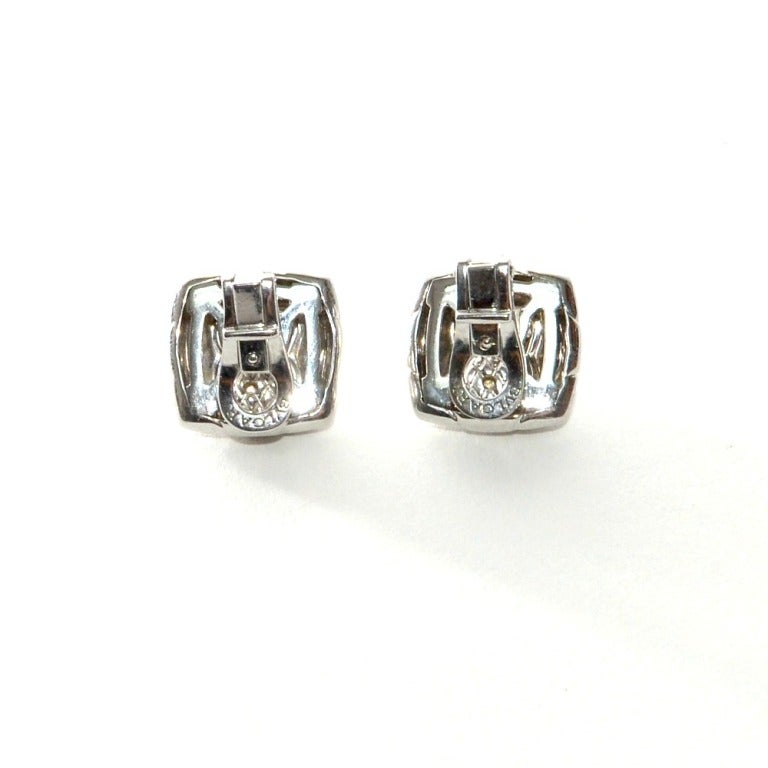 Brand: BVLGARI 
Metal: 18K WHITE GOLD 
Style: PYRAMID PAVE DIAMOND EARRINGS
Diamonds:  F-G in color with a VVS clarity.
Diamond Weight: .50ct
Measurements: 15 x 15 MM
Weight: 10.5Grams
Retail $5300