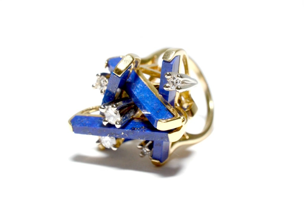 Era:  1970's

Gender:  Women's 

Stones: Lapis & Diamond 

Metal: 18k Yellow Gold Ring.

Ring Size: 7.25
