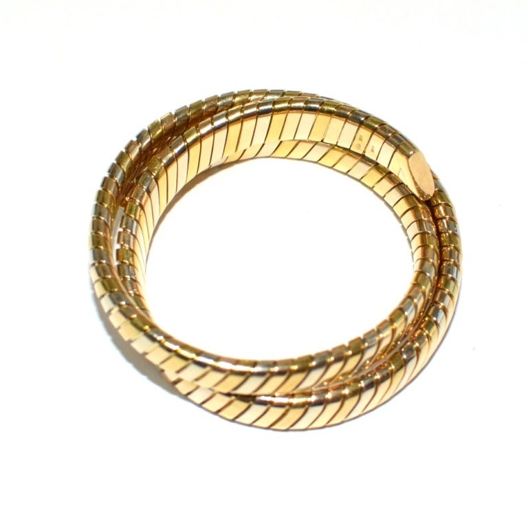 BRAND: BVLGARI BULGARI 

STYLE: TUBOGAS 

METAL: Tri- Color 18K GoLD

STYLE: SNAKE BRACELET.

GRAMS; 89.6

HALLMARKS: BVLGARI 750 2337AL

RETAIL: 9100