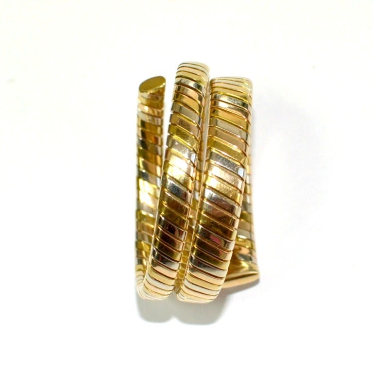 BVLGARI BULGARI TUBOGAS Tri- Color SNAKE BRACELET. In Excellent Condition In Houston, TX