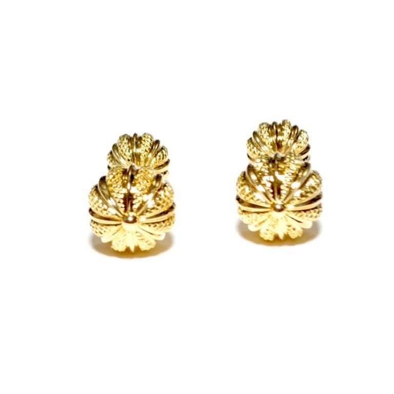 Brand: Tiffany & Co

Designer: Jean Schlumberger

Metel: Yellow Gold

Style: Seed Dumbbell Cufflinks

Hallmarks: Tiffany 18k Schlumberger