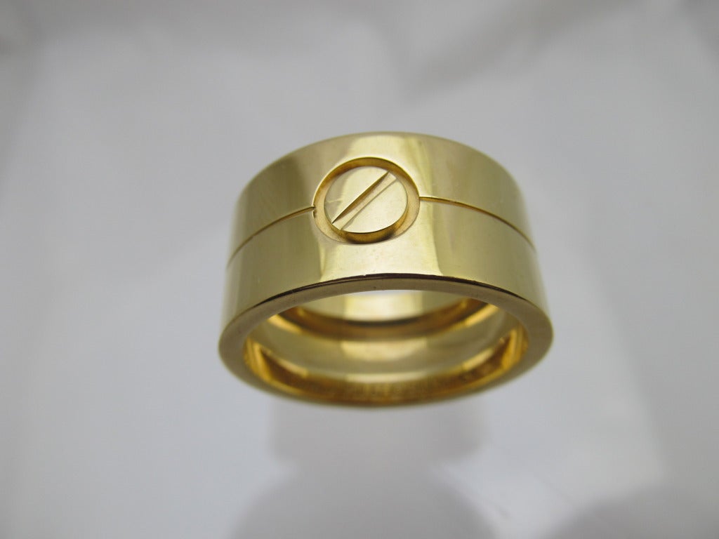 Cartier love ring
18 k gold
Inside engraved 750 67 BK 1361
Total weight is 14.2 DWT 
Ring size is 12
1.2cm wide