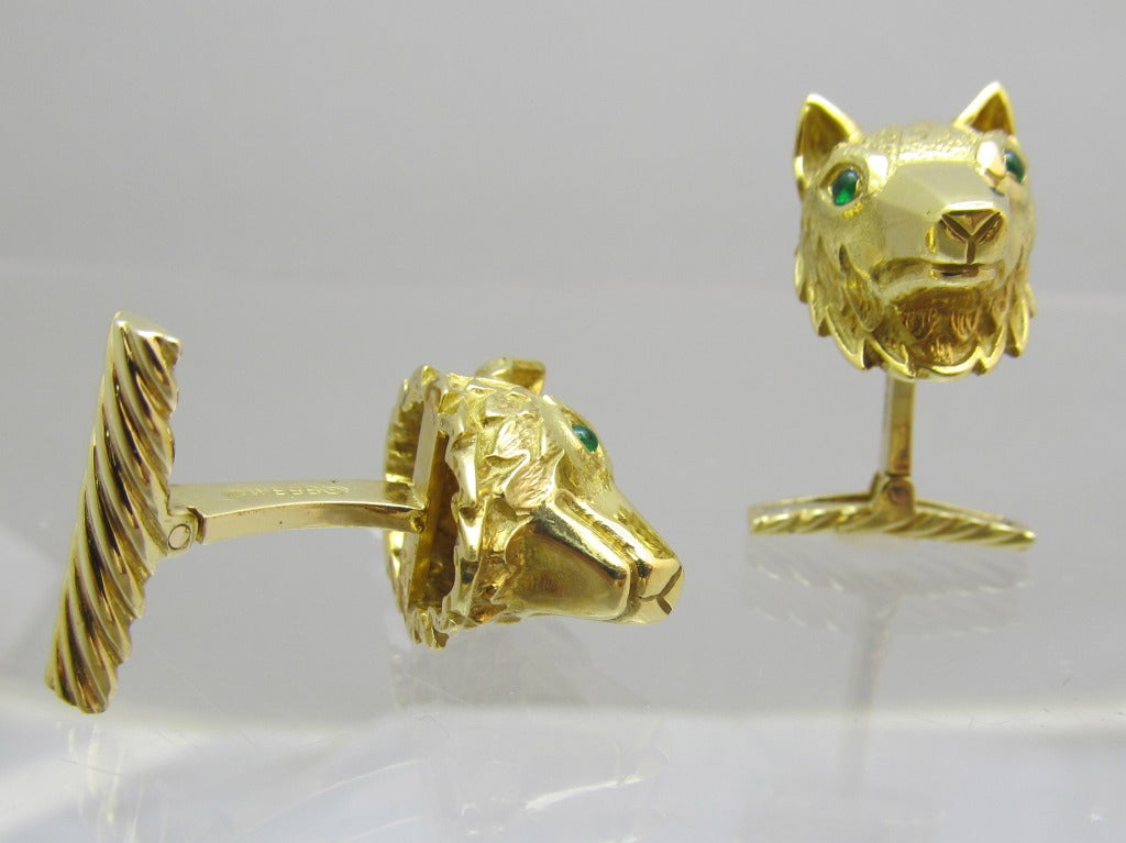 David Webb Gold Wolf cufflinks. 18kt gold cufflinks with 2 emerald eyes.

Weight: 24 grams

Measurements:
Length: 1.25 inches
Width: 0.5 inches
Signed: David Webb

Creator: 
David Webb