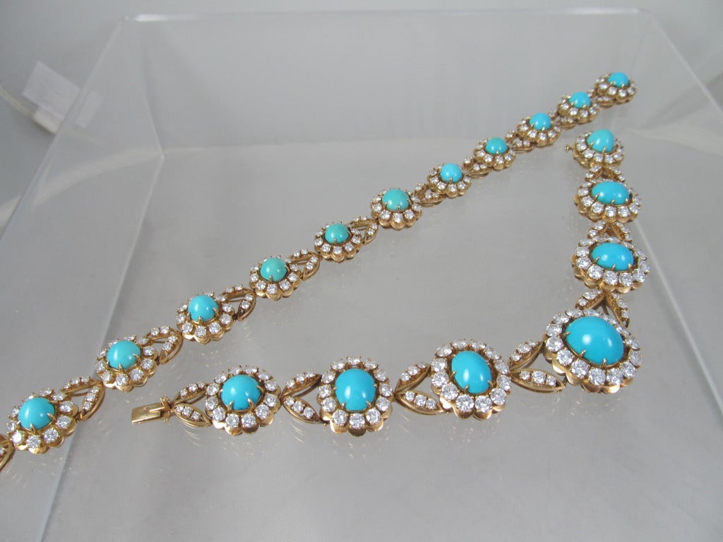 Van Cleef & Arpels, Turquoise and Diamond Necklace. 
This beautiful, classic signature piece, consists of a symmetrical series of turquoise and diamond clusters in descending size, spaced by circular-cut diamond links mounted in gold.  May also be